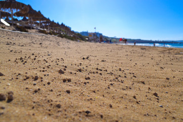 Fototapeta na wymiar Sand beach close-up. Summer. Sea. Cyprus. Ayia Napa