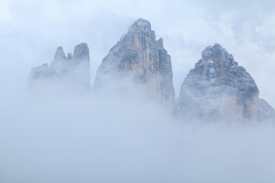 Fototapeta Tre Cime di Lavaredo in beautiful surroundings in the Dolomites at foggy weather   (Drei Zinnen)