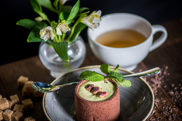 Delicious dessert with tea side view