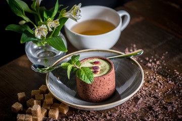 Delicious dessert with tea side view