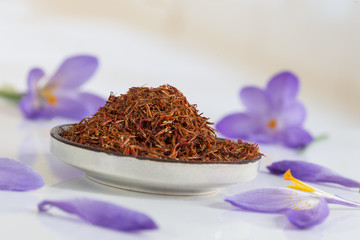 Obraz na płótnie Canvas Flower crocus and dried saffron spice isolated on white background.