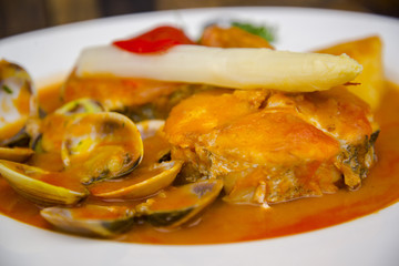 Stewed and garnished fish dish