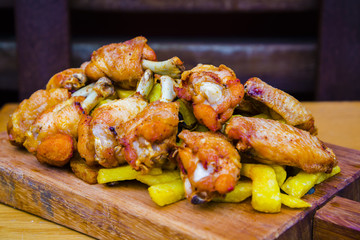 Roasted chicken wings and thighs dish