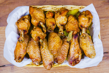 Roasted chicken wings and thighs dish