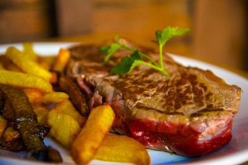 Tasty garnished meat steak