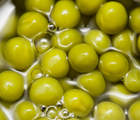 Canned green peas as a background