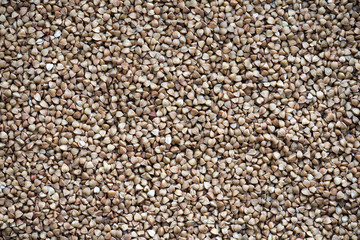 Buckwheat, food background, texture, natural brown color