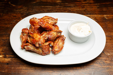 Fried wings with sauce