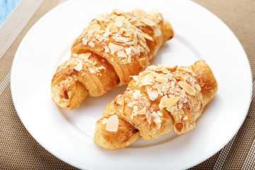 croissant with almonds breakfast