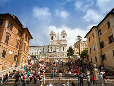 People climbing the Spanish Steps in Rome