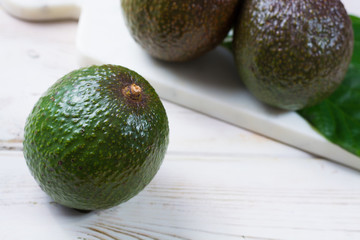 Green ripe avocado from organic avocado plantation - healthy food