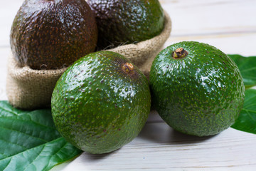 Green ripe avocado from organic avocado plantation - healthy food