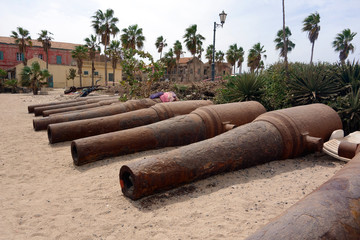 Fototapeta na wymiar Big old broken canon at the top of Ile de Goree island, Dakar, Senegal
