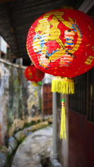 Chinese lantern in hanging in a small alley way in Penang, Malaysia
