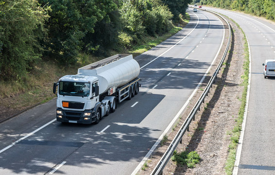 White cistern in motion on the motorway