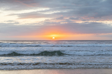 Cloudy and colourful beach sunrse on the Gold Coast