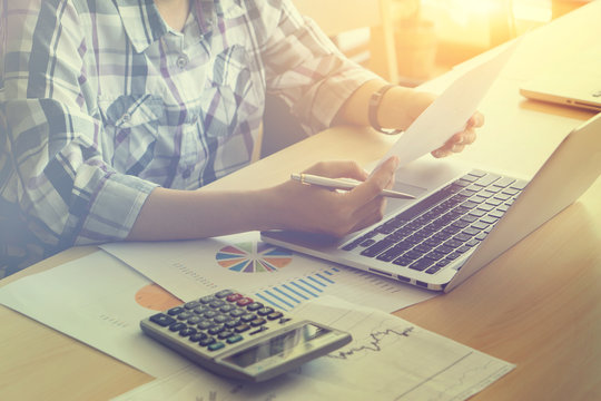 Businessman Typing Keyboard Laptop Hand.Project Manager Researching Process.Business Team Working Startup modern Office.Global Strategy Graphs Interfaces.Analyze market stock,selective focus