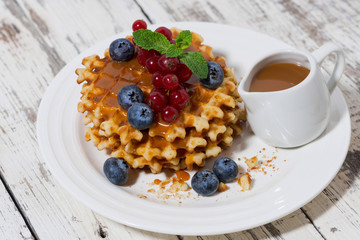 waffles with berries and caramel