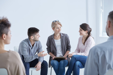 Psychologist helping his patients