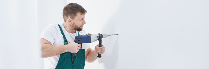 Man with professional drill