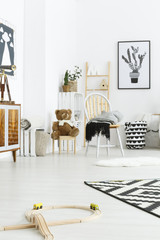 White child room with chair