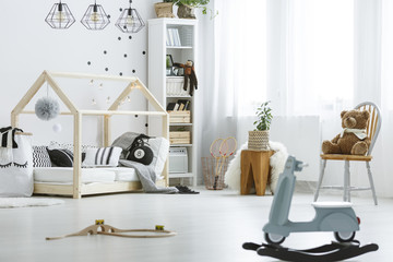 White, child room with toys