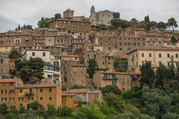 Fototapeta premium Campiglia is a beautiful medieval town that sits on a hill overlooking the surrounding region of Tuscany 