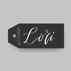 Common female first name Doris on a tag. Hand drawn calligraphy. Wedding typography element.