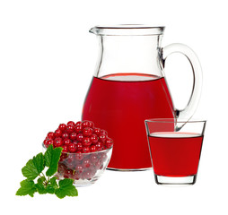red currant drink in a glass and a decanter with berries currants