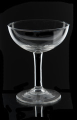 Empty wine glass isolated on a black background