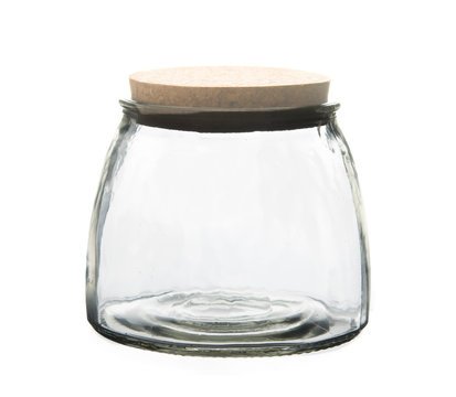 Empty glass jar with cork stopper isolated on white