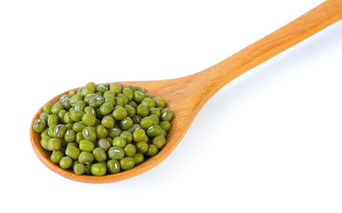 green beans in wood spoon isolated on white background