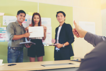 business team professionals present their work to the boss or customer.