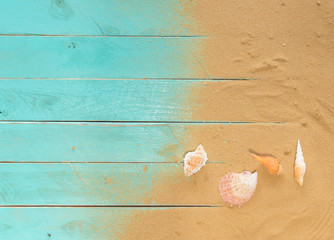 Sea sand and Sea shells on blue wooden floor,Top view with copy space