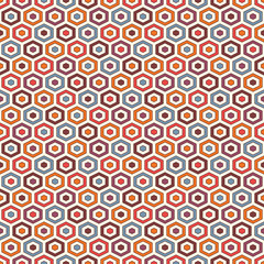Fototapeta na wymiar Honeycomb background. Vivid colors repeated hexagon tiles wallpaper. Seamless pattern with classic geometric ornament.