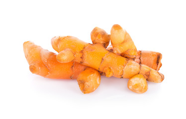 fresh turmeric roots on white background