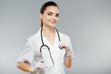 Female doctor in white medical robe