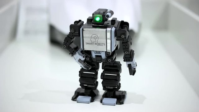 Little robot moves close up.