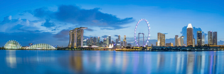 Singapore business district skyline at Marina Bay on twilight time.