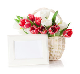 Colorful tulips and photo frame