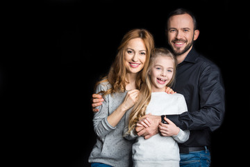 Happy family standing together