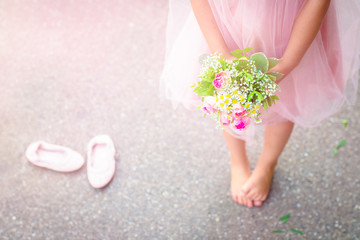 little girl with flowers. selective focus
