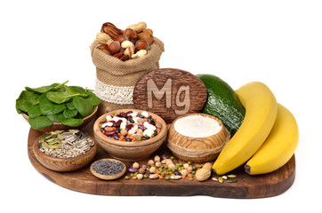 Foods containing magnesium on white background . Healthy diet eating concept.