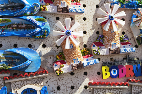 Close up view of Bodrum souvenirs and magnets reflecting Aegean and mediterranean lifestyle.