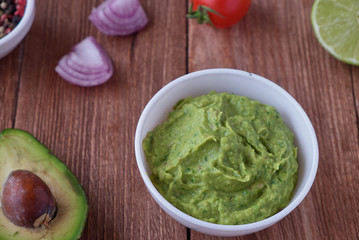 Traditional mexican guacamole sauce with avocado