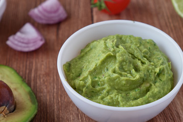 Traditional mexican guacamole sauce with avocado