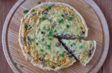 Traditional french quiche pie with chicken and mushroom