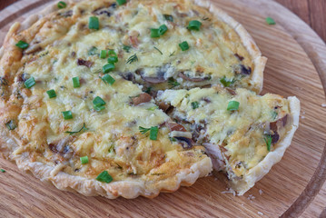 Traditional french quiche pie with chicken and mushroom