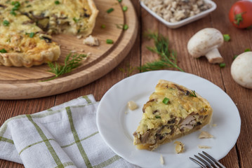 Traditional french quiche pie with chicken and mushroom