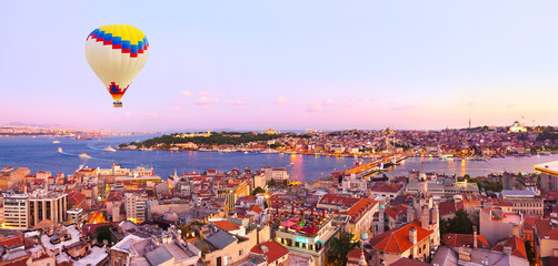 Hot air balloon over Istanbul sunset